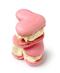 Sweet heart-shaped macaroons on white background. Valentine's Day celebration