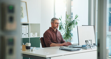 Review, man or typing with computer in office, internal control or risk management observation. Compliance report, check financial records or auditor with pc for inspection, action plan or accuracy