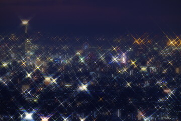 光り輝く抽象的な街明かり 生駒山から見た、大阪平野夜景　海遊館観覧車