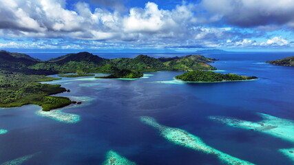 drone shot of roderick bay, tulagi, blue and turquoise lagoon © Janette Emerich