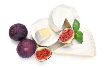 Tasty Camembert cheese and fresh ripe figs on white background, closeup