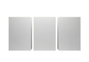 Fototapeta premium Three blank white book covers standing upright isolated on transparent background