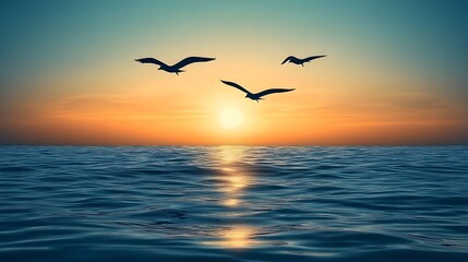 Fototapeta premium Sunset over ocean with seagulls flying coastal landscape tranquil environment