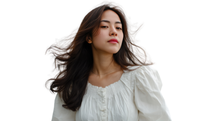 Poised Beauty: A captivating young woman, her dark hair flowing in the wind, exudes an air of serenity. Delicate features and elegant pose create a sense of ethereal beauty. 