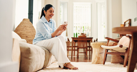 Woman, laugh and scroll with phone on sofa for funny social media video, online dating and virtual chat. Happy, person and browsing in home with tech for text message, internet humor and mobile app.