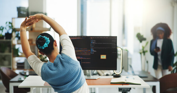 Back, computer screen and stretching with woman programmer at work for health or wellness. Arms, coding and flexibility with web developer person in coworking office for development or programming - Powered by Adobe