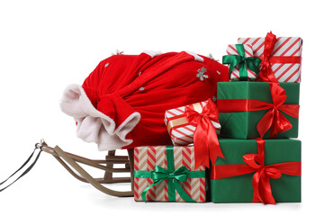 Sled with Santa Claus bag and gifts isolated on white background