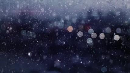 Close-up view of snowflakes against a black background