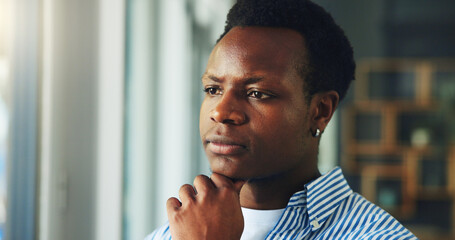 Creative, black man and thinking with vision in office for project strategy, improvement or insight. Businessman, employee or thoughtful designer with idea or solution for company agenda or tasks