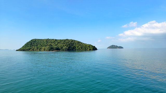 Tropical island Ko Tae Nai surrounded by calm blue ocean near Island Ko Pha-Ngan, Surat Thani, Thailand.