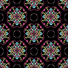 Multicolor damask ethnic floral seamless pattern on a black background. Abstract kaleidoscope fabric design texture.  Retro vintage style. Vector texture. Ideas for textiles, wallpapers, and rugs.
