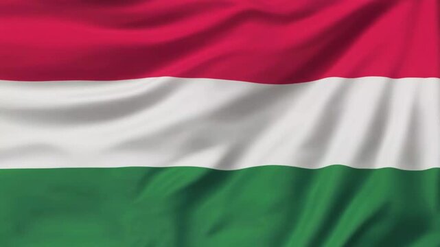Hungary national flag is waving or flying in close up