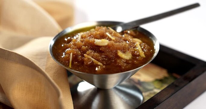 Moong dal halwa is a classic Indian sweet dish made with moong lentils, sugar, ghee and cardamom powder	
