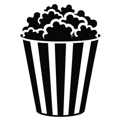 Striped bucket brimming with black popcorn offers a simple monochrome treat for movie night