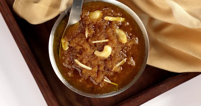 Moong dal halwa is a classic Indian sweet dish made with moong lentils, sugar, ghee and cardamom powder	
