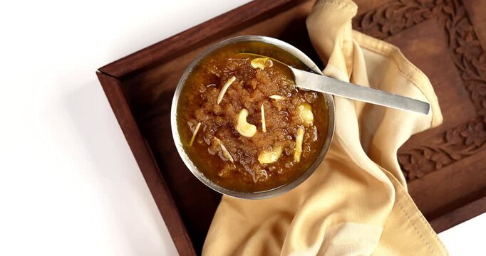 Moong dal halwa is a classic Indian sweet dish made with moong lentils, sugar, ghee and cardamom powder	
