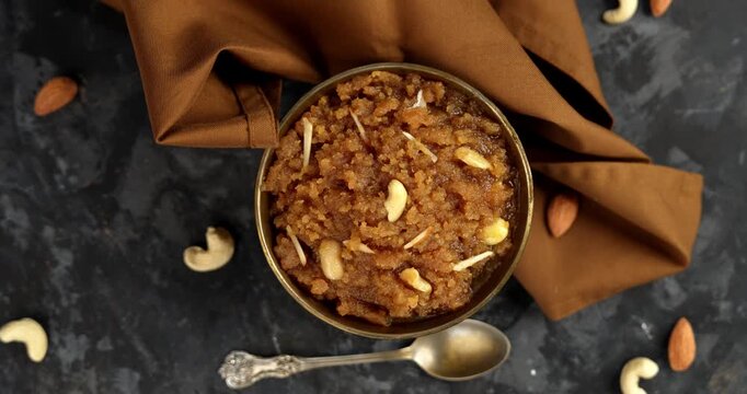 Moong dal halwa is a classic Indian sweet dish made with moong lentils, sugar, ghee and cardamom powder	

