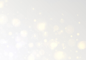Soft golden dust glows with sparkling highlights and radiant flare. Twinkling particles shimmer across the blur and bokeh, creating a festive Christmas and New Year sparkling overlay.