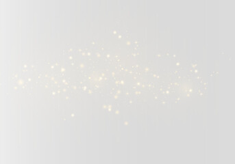 Golden dust png with yellow Christmas sparkles floats gently on a transparent background. Light...
