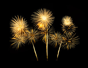 Golden firework sparkling on black background for celebration and anniversary