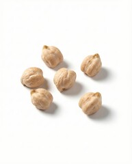 Scattered Raw Chickpeas Isolated on White Background | Dried Organic Garbanzo Beans for Hummus, Falafel, and Healthy Vegan Protein Concepts