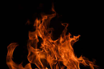 Fire blaze flames on black background. Fire burn flame isolated, abstract texture. Flaming explosion effect with burning fire.