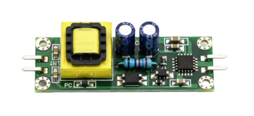 Close-up view of a green electronic circuit board with various components.