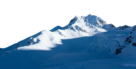 Snow-covered mountain peaks under clear sky