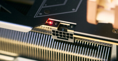 Angled 600W power adapter inserted into GPU slot