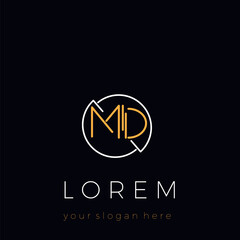The logo is the initials MD. The monogram logo is framed within the letters MD.