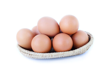  Basket of brown chicken eggs, minimal design, isolated on white background for clean presentation.