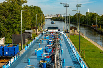 A cargo ship in the lock chamber, Frankfurt-Griesheim, Hesse, Germany