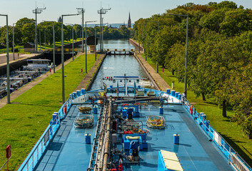 A cargo ship in the lock chamber, Frankfurt-Griesheim, Hesse, Germany