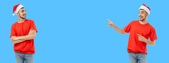 Young man wearing a red shirt and Santa hat smiling and gesturing