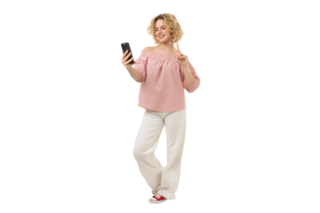 Happy woman using a smartphone standing, isolated on white, PNG