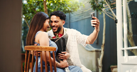 Happy, couple and selfie with roses, home and celebration of anniversary with post on website or app. Outdoor, man and picture with woman on valet day, excited and memory for social media and online