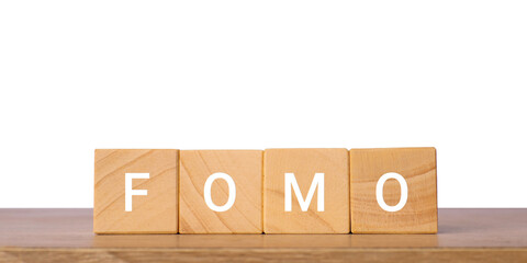 Wooden blocks with word fomo for marketing fear of missing out concept, isolated on transparent background