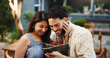 Love, couple and surprise with roses in restaurant for romantic gift, anniversary date and bonding. Celebration, people and smile with bouquet at cafe for loyalty, healthy relationship and connection