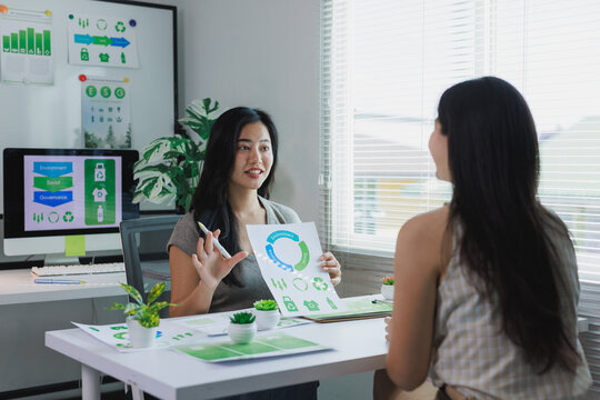 Woman presenting esg sustainability report to client