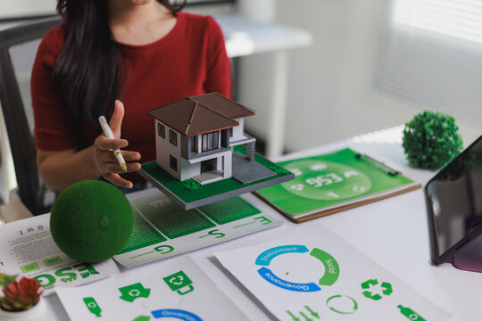 Woman presenting green building esg concept