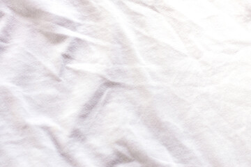 White fabric surface showing soft crumpled texture