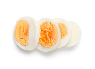 Slices of fresh boiled egg on white background