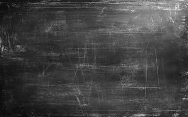 Obraz premium Blackboard texture background with dark wall backdrop. Rough grainy stone surface in black and dark gray tones. Vintage grunge wall with old textured design