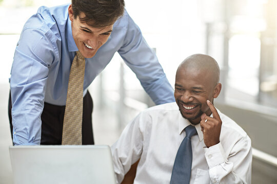Business, men and laptop with laughing in meeting for market shift, stock price or economy update. Trading, happy team and tech in office for financial report, funny investment advice and discussion - Powered by Adobe