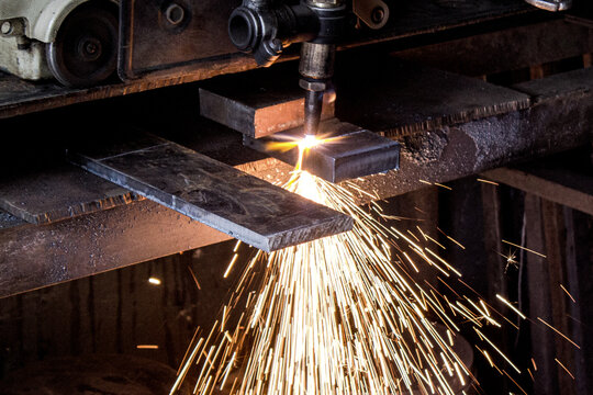 Metal Cutting Process with Flame Torch and Sparks in Factory Engineering Environment