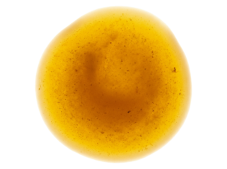 Close up abstract macro shot of a yellow liquid droplet. isolated on transparent background