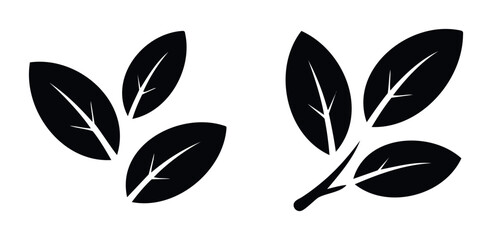 Two minimalist black leaf icons representing nature and growth, perfect for organic product branding and ecological themes.