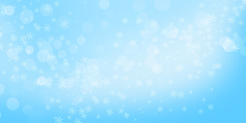 Blue background. Winter background, snowflakes on a beautiful background, Christmas background for cards, snowfall. Snowy natural scenery, forming bokeh lights.