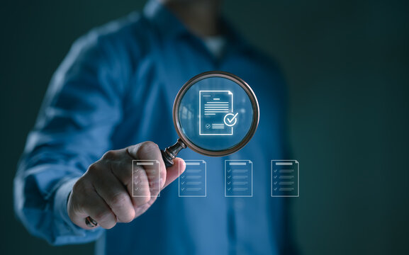 Businessman holding magnifying glass inspecting digital document with checklist and approved mark. Concept for document review, audit process, quality control, compliance, and verification.