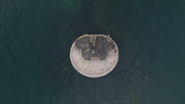Aerial view St Helens Fort, sea fort in the Solent close to the Isle of Wight, was built as result of the Royal Commission on the Defence of the United Kingdom of 1859, drone descending over the fort